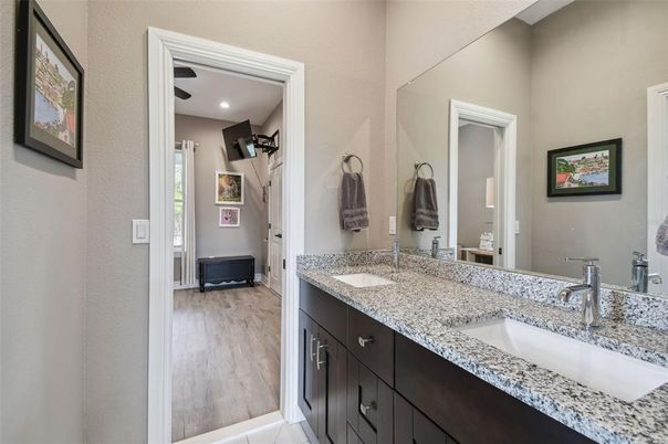 Bathroom, Dual Sink Vanities, Interior, Recessed Lighting, Wood Texture Flooring