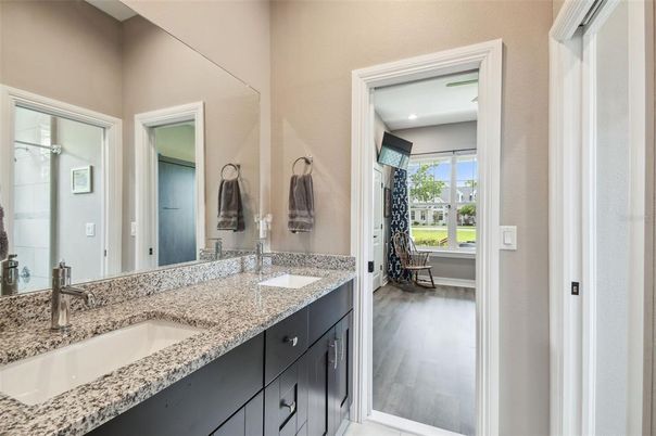 Bathroom, Dual Sink Vanities, Interior, Recessed Lighting, Wood Texture Flooring