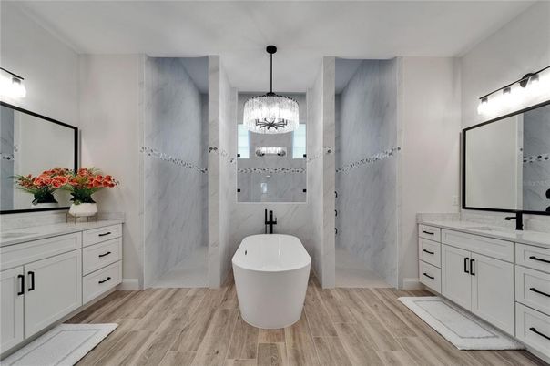 Bathroom, Chandelier, Free Standing Baths, Interior, Marble Walls, Pendant Lights, Wood Texture Flooring