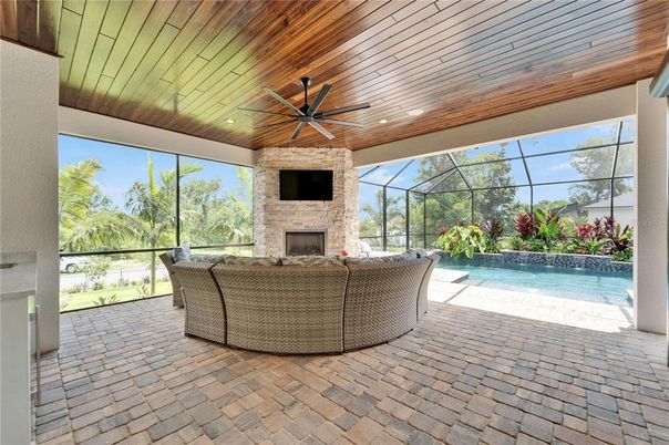 Fireplace, Glass Ceilings, Interior, Living room, Pool, Recessed Lighting, Sun Room, Wooden Ceilings