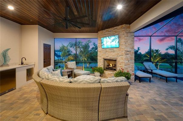 Fireplace, Glass Ceilings, Interior, Living room, Recessed Lighting, Stone Walls, Sun Room, Wooden Ceilings