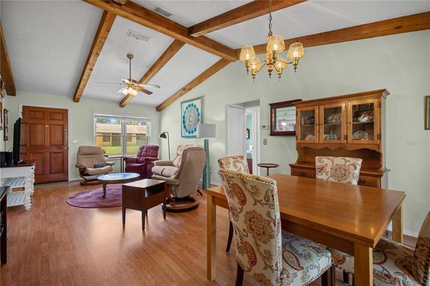 Chandelier, Dining room, Fireplace, Interior, Living room, Wooden Beams, Wood Texture Flooring