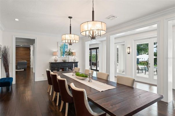 Chandelier, Dining room, Fireplace, Interior, Recessed Lighting, Wood Texture Flooring