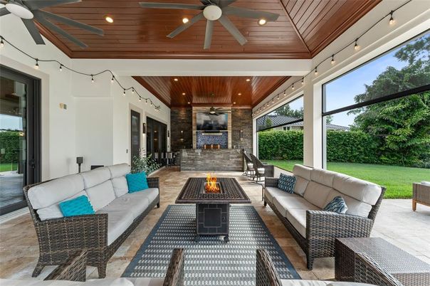 Exterior, Fireplace, Interior, Living room, Recessed Lighting, Stone Walls, Wooden Ceilings