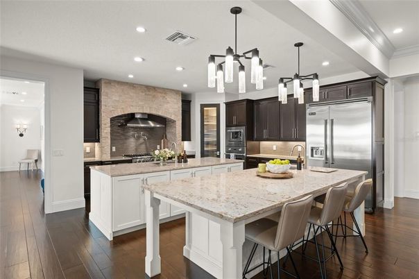 Interior, Kitchen, Pendant Lights, Recessed Lighting, Stainless Steel Appliances, Stone Walls, Wood Texture Flooring
