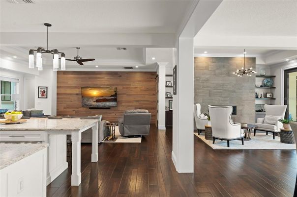 Fireplace, Interior, Living room, Pendant Lights, Recessed Lighting, Stone Walls, Wood Texture Flooring, Wooden Walls