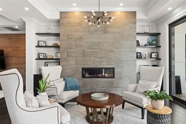 Fireplace, Interior, Living room, Pendant Lights, Recessed Lighting, Stone Walls, Wood Texture Flooring, Wooden Walls