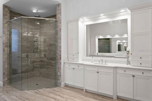 Bathroom, Chandelier, Dual Sink Vanities, Interior, Recessed Lighting, Wood Texture Flooring