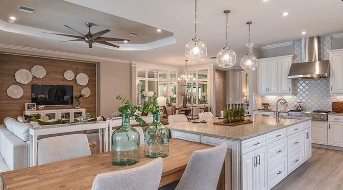 Chandelier, Dining room, Interior, Kitchen, Pendant Lights, Recessed Lighting, Stainless Steel Appliances, Wood Texture Flooring