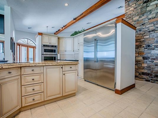 Interior, Kitchen, Recessed Lighting, Stainless Steel Appliances, Stone Walls