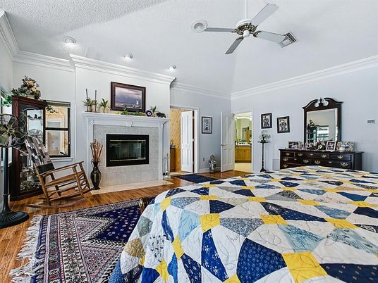 Bedroom, Fireplace, Interior, Recessed Lighting, Wood Texture Flooring