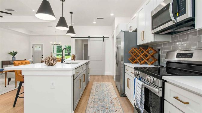 Interior, Kitchen, Pendant Lights, Recessed Lighting, Stainless Steel Appliances, Wood Texture Flooring