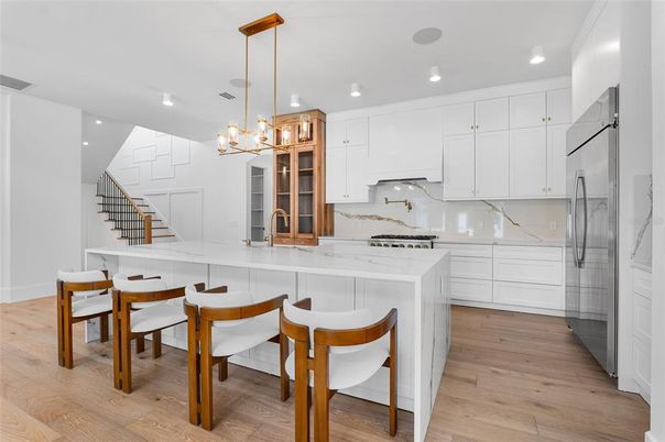 Interior, Kitchen, Marble Walls, Pendant Lights, Recessed Lighting, Wood Texture Flooring