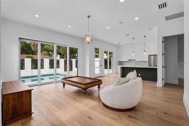 Billiard Table, Game Room, Interior, Kitchen, Pendant Lights, Recessed Lighting, Stainless Steel Appliances, Wood Texture Flooring