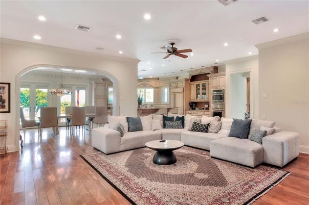 Chandelier, Dining room, Interior, Kitchen, Living room, Recessed Lighting, Stainless Steel Appliances, Wood Texture Flooring