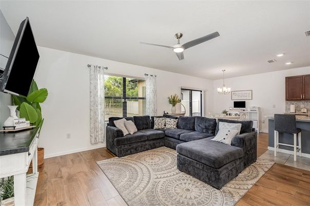 Chandelier, Dining room, Interior, Kitchen, Living room, Pendant Lights, Recessed Lighting, Wood Texture Flooring