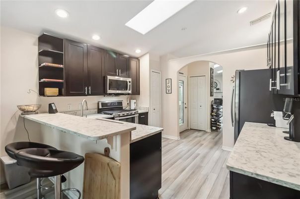 Interior, Kitchen, Recessed Lighting, Stainless Steel Appliances, Wood Texture Flooring