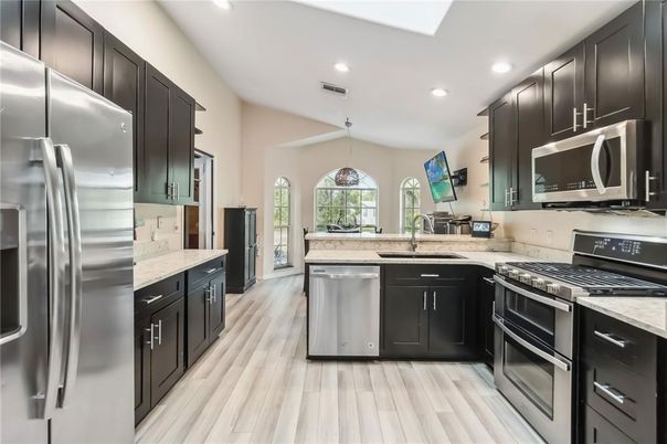 Interior, Kitchen, Recessed Lighting, Stainless Steel Appliances, Wood Texture Flooring