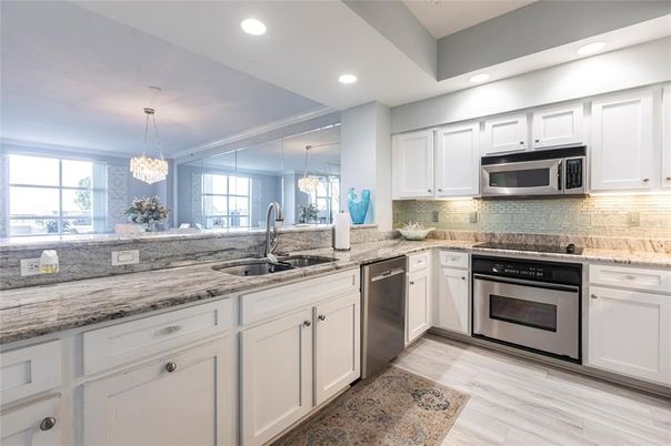 Chandelier, Interior, Kitchen, Recessed Lighting, Stainless Steel Appliances, Wood Texture Flooring