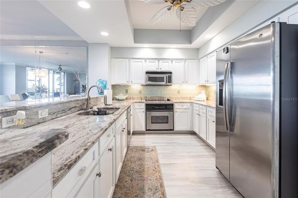 Chandelier, Interior, Kitchen, Recessed Lighting, Stainless Steel Appliances, Wood Texture Flooring