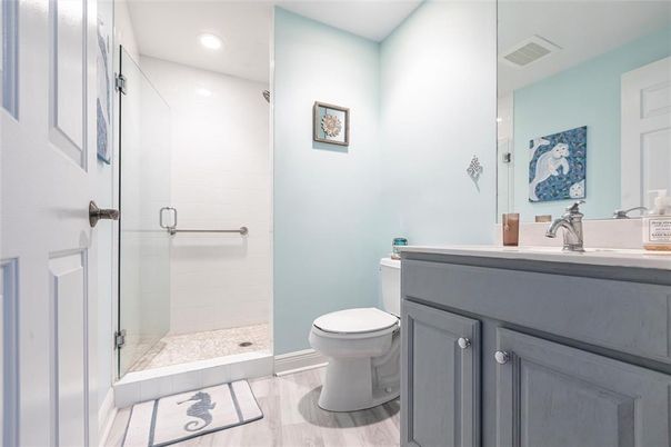 Bathroom, Glass Shower, Interior, Recessed Lighting, Wood Texture Flooring