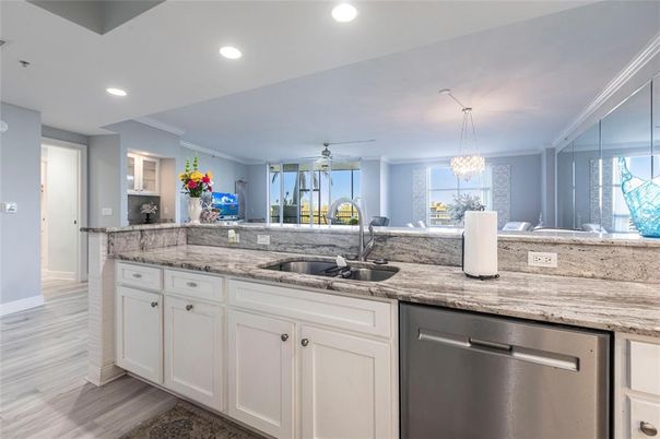 Chandelier, Interior, Kitchen, Recessed Lighting, Stainless Steel Appliances, Wood Texture Flooring