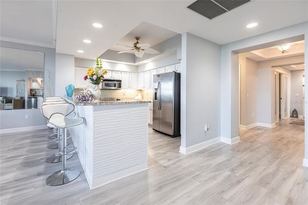 Interior, Kitchen, Recessed Lighting, Stainless Steel Appliances, Wood Texture Flooring