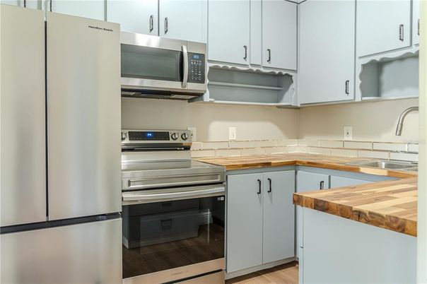 Interior, Kitchen, Stainless Steel Appliances, Wood Texture Flooring