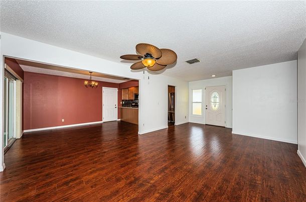 Chandelier, Empty room, Interior, Recessed Lighting, Wood Texture Flooring