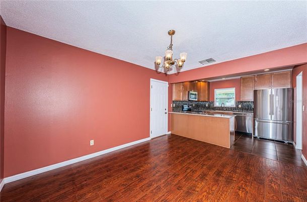 Chandelier, Interior, Kitchen, Stainless Steel Appliances, Wood Texture Flooring