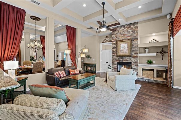 Dining room, Fireplace, Interior, Living room, Pendant Lights, Recessed Lighting, Stone Walls, Wood Texture Flooring