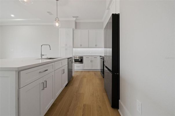 Interior, Kitchen, Pendant Lights, Recessed Lighting, Stainless Steel Appliances, Wood Texture Flooring