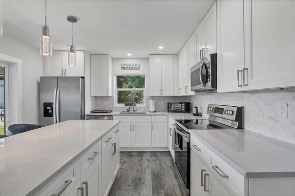 Interior, Kitchen, Pendant Lights, Recessed Lighting, Stainless Steel Appliances, Wood Texture Flooring