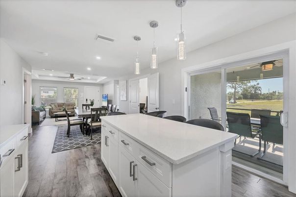 Dining room, Interior, Kitchen, Living room, Pendant Lights, Recessed Lighting, Wood Texture Flooring