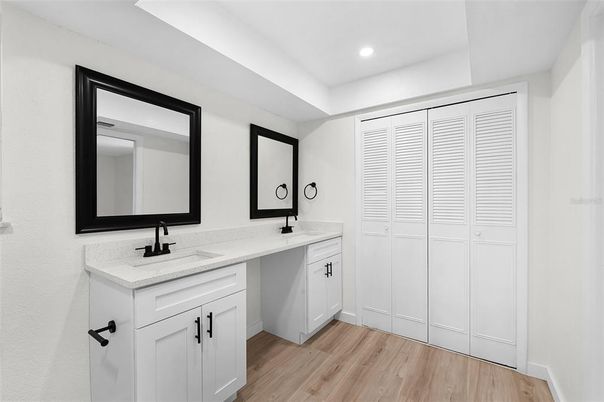 Bathroom, Dual Sink Vanities, Interior, Recessed Lighting, Wood Texture Flooring