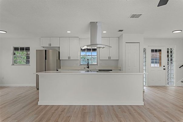 Interior, Kitchen, Recessed Lighting, Stainless Steel Appliances, Wood Texture Flooring