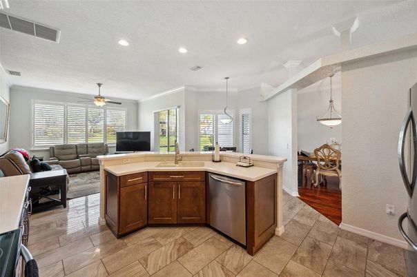Dining room, Interior, Kitchen, Living room, Pendant Lights, Recessed Lighting, Stainless Steel Appliances, Wood Texture Flooring