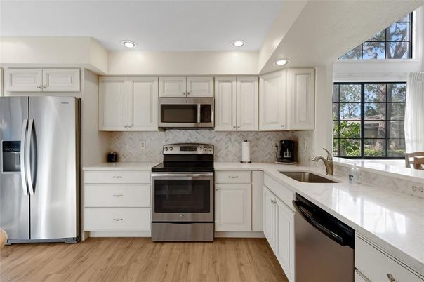 Interior, Kitchen, Recessed Lighting, Stainless Steel Appliances, Wood Texture Flooring