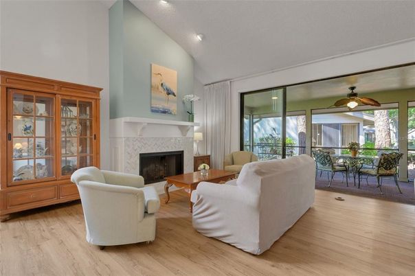 Dining room, Fireplace, Interior, Living room, Recessed Lighting, Wood Texture Flooring
