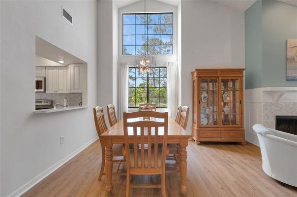 Dining room, Fireplace, Interior, Kitchen, Pendant Lights, Wood Texture Flooring