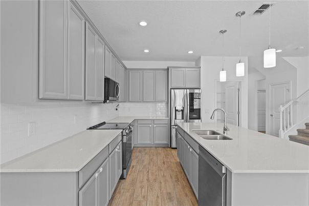 Interior, Kitchen, Pendant Lights, Recessed Lighting, Stainless Steel Appliances, Wood Texture Flooring