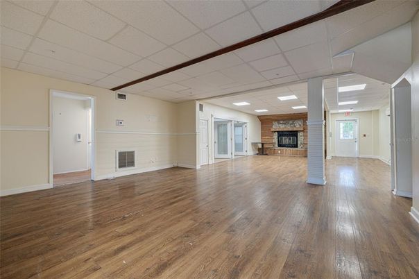 Empty room, Fireplace, Interior, Recessed Lighting, Wooden Beams, Wood Texture Flooring
