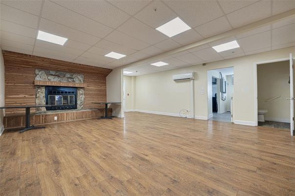 Empty room, Fireplace, Interior, Recessed Lighting, Wood Texture Flooring, Wooden Walls