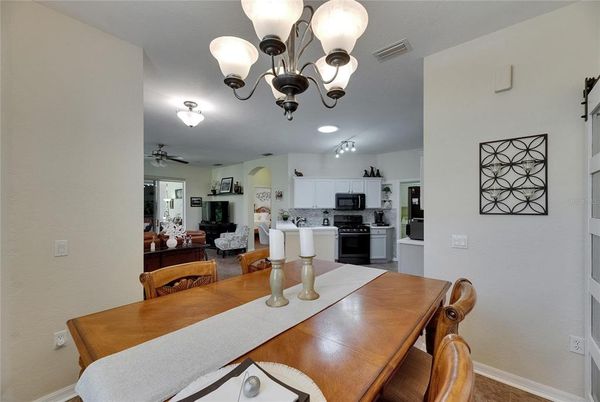 Chandelier, Dining room, Interior, Kitchen, Living room, Stainless Steel Appliances