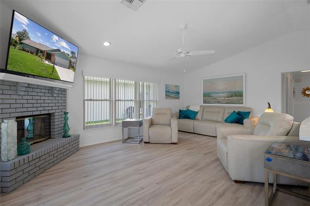 Fireplace, Interior, Living room, Recessed Lighting, Wood Texture Flooring