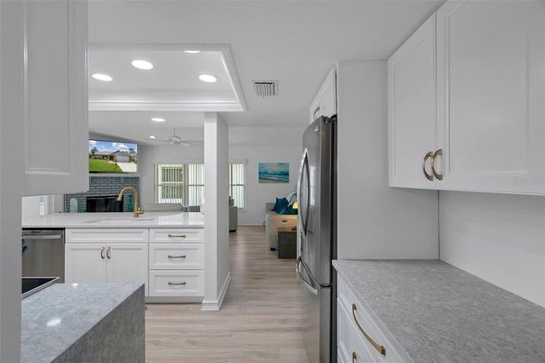 Interior, Kitchen, Recessed Lighting, Stainless Steel Appliances, Wood Texture Flooring