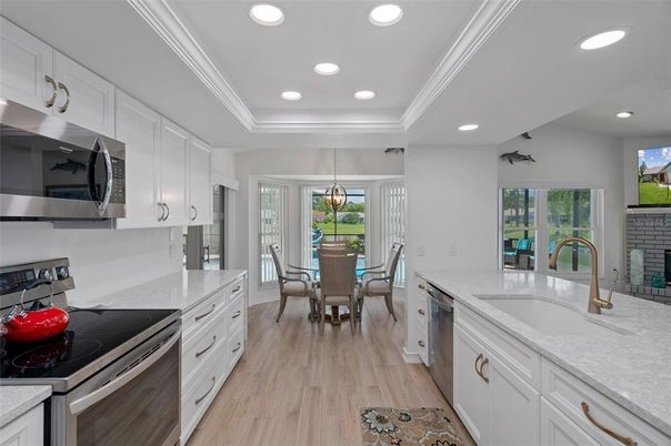 Dining room, Interior, Kitchen, Pendant Lights, Recessed Lighting, Stainless Steel Appliances, Wood Texture Flooring