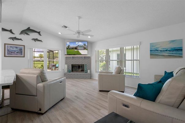 Fireplace, Interior, Living room, Recessed Lighting, Wood Texture Flooring