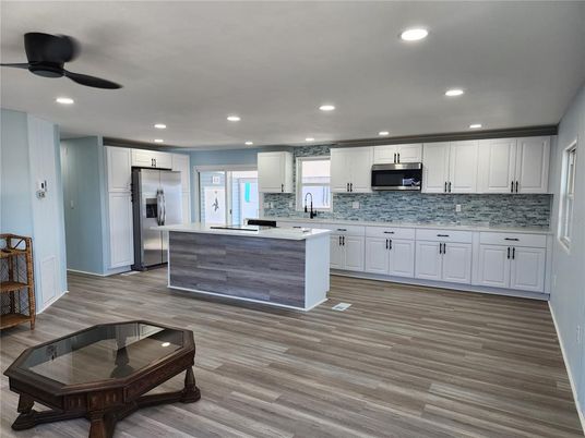 Interior, Kitchen, Recessed Lighting, Stainless Steel Appliances, Wood Texture Flooring