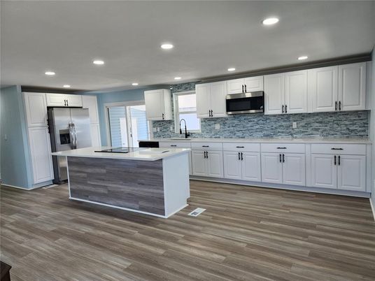 Interior, Kitchen, Recessed Lighting, Stainless Steel Appliances, Wood Texture Flooring